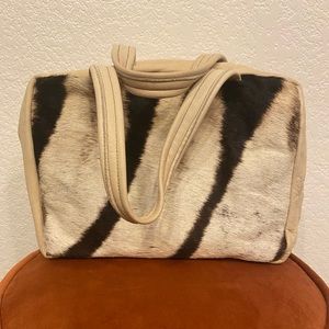 Animal hide makeup bag